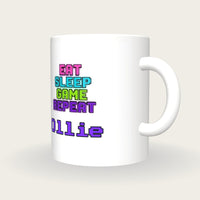 Personalised Eat Sleep Game Repeat Gamer Mug, three-quarter view