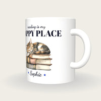 Personalised Cat Asleep On Books Mug, Reading Is My Happy Place, three-quarter view
