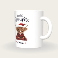 Personalised Christmas Highland Cow Mug, Santa's Favourite, three-quarter view