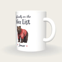 Personalised Christmas Jumper Bear Mug, On The Nice List, three-quarter view