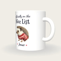 Personalised Christmas Jumper Hedgehog Mug, On The Nice List, three-quarter view