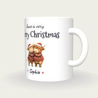 Personalised Hugging Highland Cows Mug, Merry Christmas, three-quarter view