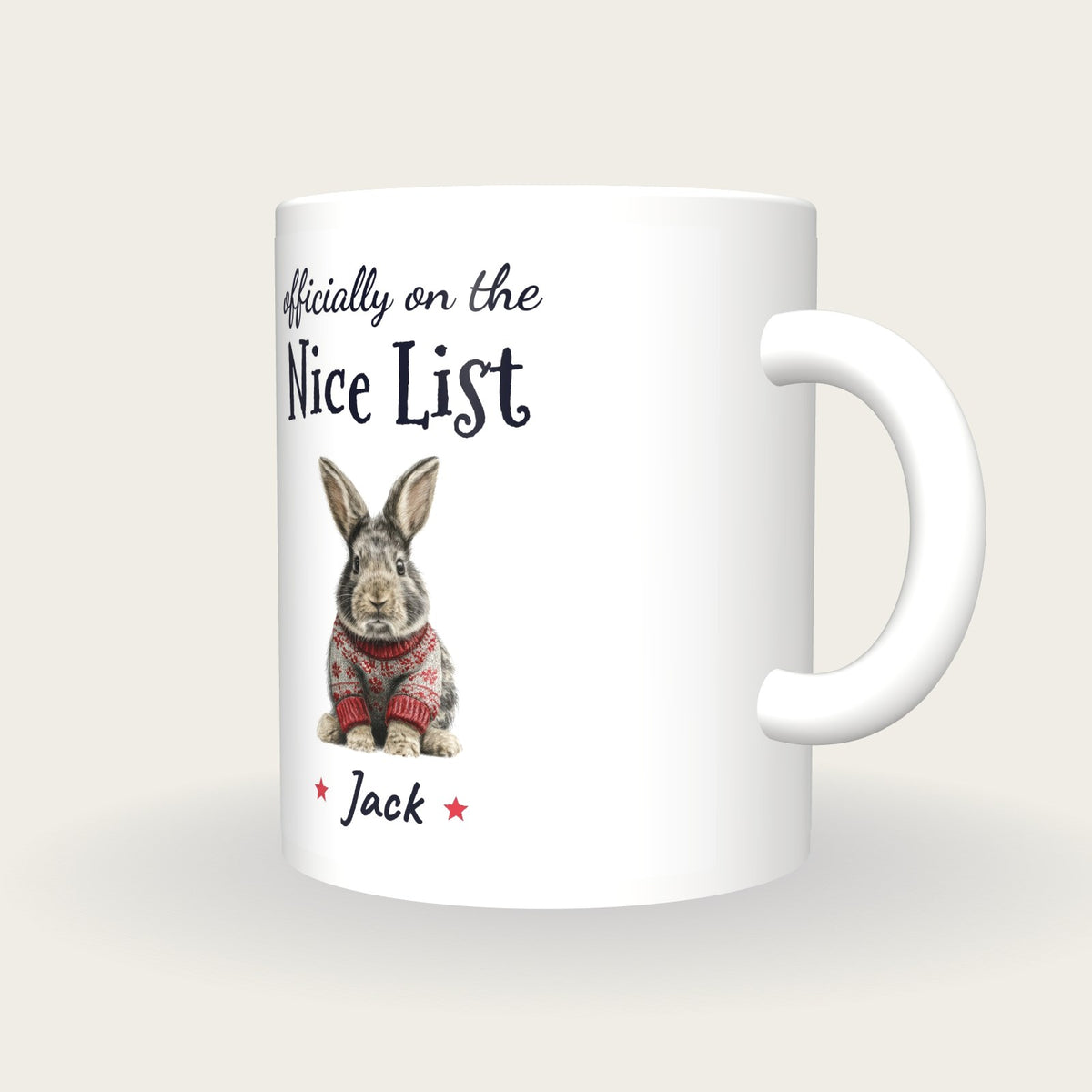 Personalised Christmas Jumper Rabbit Mug, On The Nice List, three-quarter view