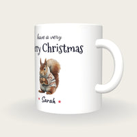 Personalised Christmas Jumper Squirrel Mug, Merry Christmas, three-quarter view