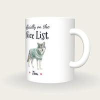 Personalised Christmas Jumper Wolf Mug, On The Nice List, three-quarter view