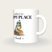 Personalised Owl On Books Mug, Reading Is My Happy Place, three-quarter view