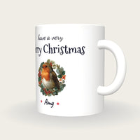 Personalised Robin In A Wreath Mug, Merry Christmas, three-quarter view