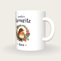 Personalised Robin In A Wreath Mug, Santa's Favourite, three-quarter view