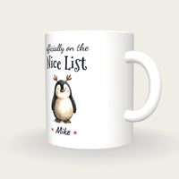 Personalised Christmas Penguin Mug, On The Nice List, three-quarter view