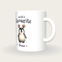 Personalised Christmas Penguin Mug, Santa's Favourite, three-quarter view