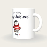 Personalised Christmas Jumper Penguin Mug, Merry Christmas, three-quarter view
