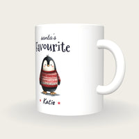 Personalised Christmas Jumper Penguin Mug, Santa's Favourite, three-quarter view