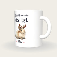 Personalised Christmas Bunny Mug, On The Nice List, three-quarter view