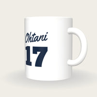 Personalised White and Royal Blue Baseball Jersey Mug, three-quarter view
