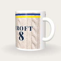 Personalised Blue and Yellow Cable Knit Cricket Shirt Mug, three-quarter view