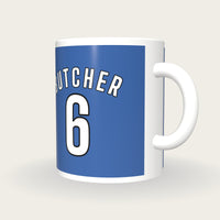 Personalised Blue and White Football Shirt Mug, three-quarter view