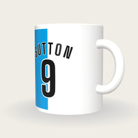 Personalised Blue and White Halves Football Shirt Mug, three-quarter view