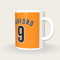 Personalised Orange and Navy Football Shirt Mug, three-quarter view