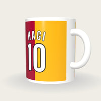 Personalised Red and Yellow Halves Football Shirt Mug, three-quarter view