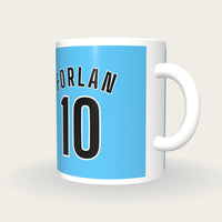 Personalised Sky Blue and Black Football Shirt Mug, three-quarter view