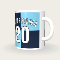 Personalised Sky Blue and Navy Quarters Football Shirt Mug, three-quarter view