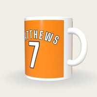 Personalised Tangerine and White Football Shirt Mug, three-quarter view