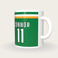 Personalised Green, White and Gold GAA Jersey Mug, three-quarter view