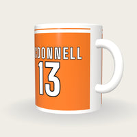 Personalised Orange and White GAA Jersey Mug, three-quarter view