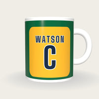 Personalised Green and Gold Netball Bib Mug, front