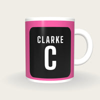 Personalised Pink and Black Netball Bib Mug, front