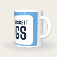 Personalised Sky Blue and White Netball Bib Mug, three-quarter view