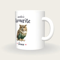Personalised Christmas Jumper Owl Mug, Santa's Favourite, three-quarter view