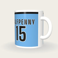Personalised Sky Blue and Black Rugby Shirt Mug, three-quarter view