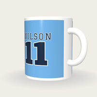 Personalised Sky Blue and Navy American Football Jersey Mug, three-quarter view